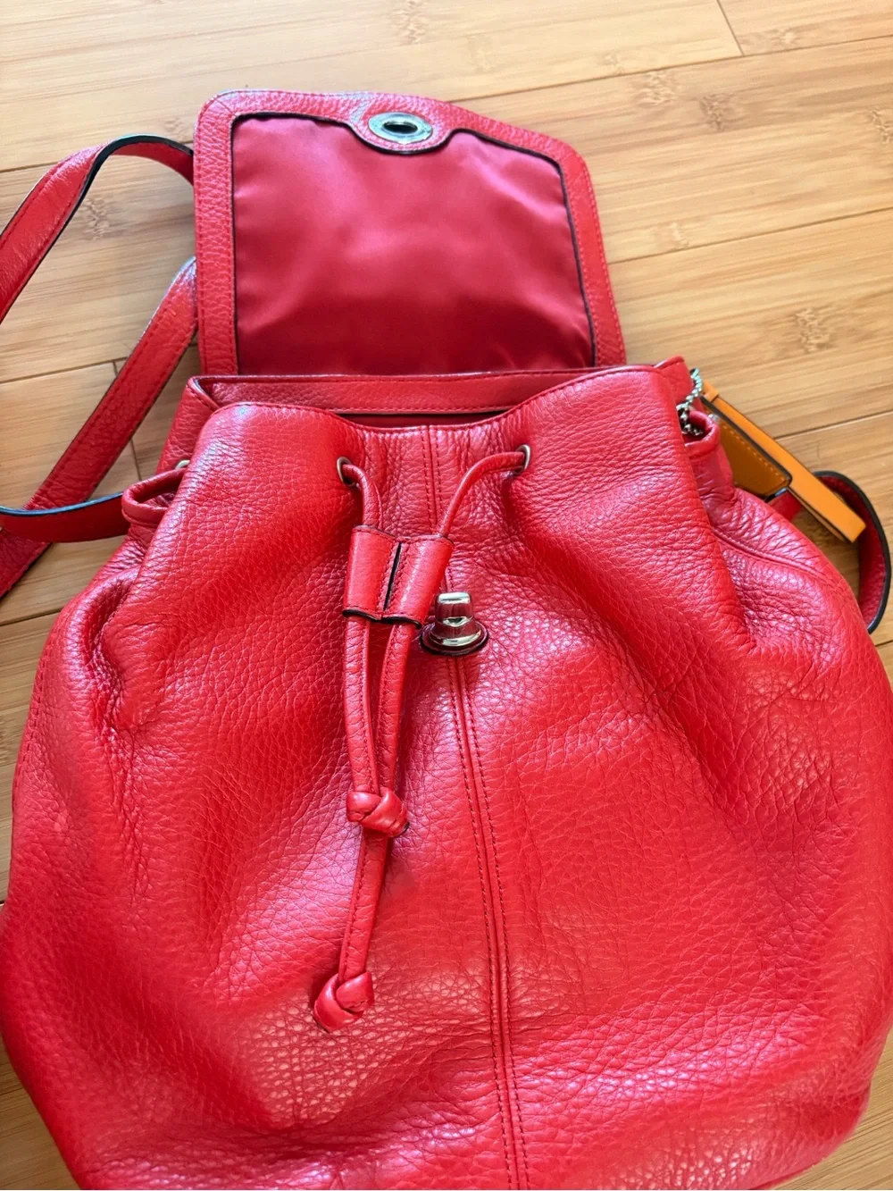 Coach Pebbled Leather Backpack in Red with Orange Tag